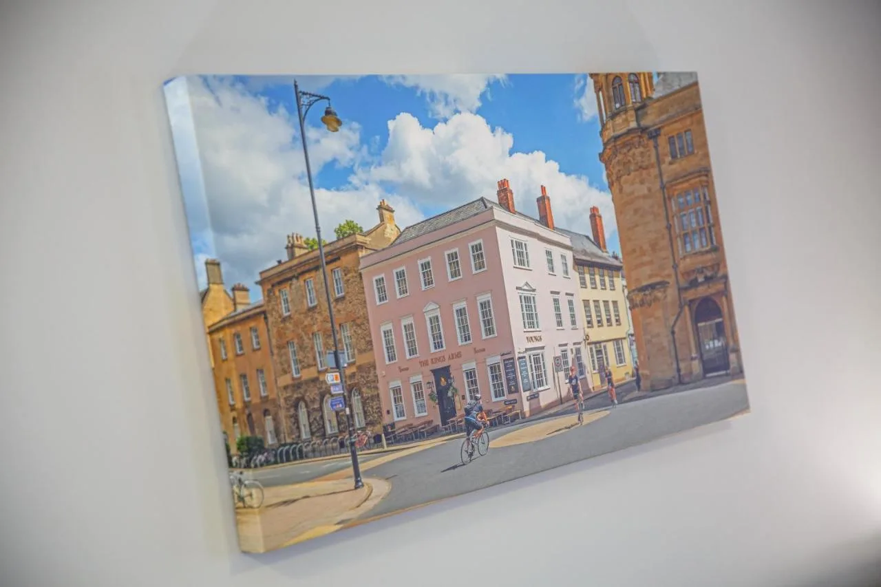 a picture of a building in front of a street at The Buttery in Oxford